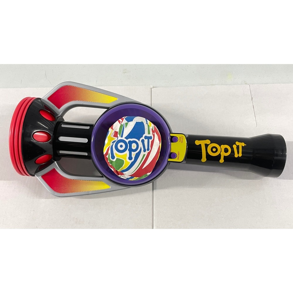 Hasbro Top It Handheld Electronic Game with Original Ball Purple Black Red